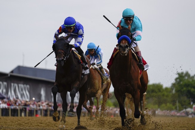 Baffert back from ban, wins Preakness with National Treasure after another horse euthanized