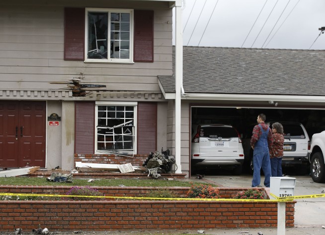 Neighbors: Plane 'sounded like a missile' as it broke apart