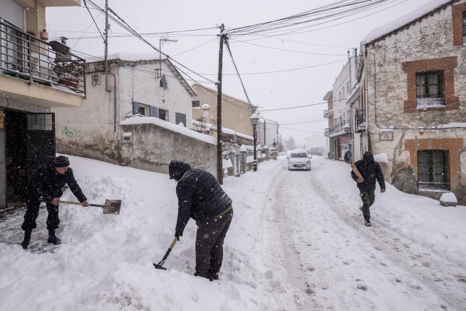 Spain shovels out of snowdrifts left by Storm Filomena