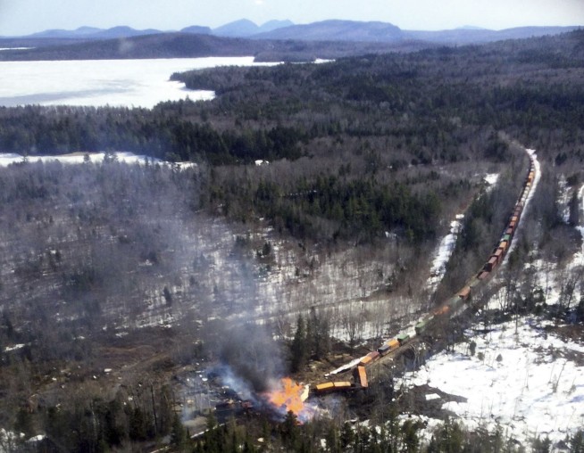 Maine train derailment that led to injuries and forest fire was caused by beaver dam, officials say