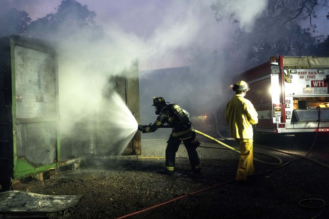 California firefighters gain ground against big wildfires after hot, windy weekend