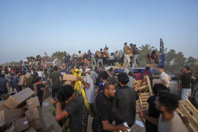 Member of Israel's War Cabinet says he'll quit the government June 8 unless there's a new war plan