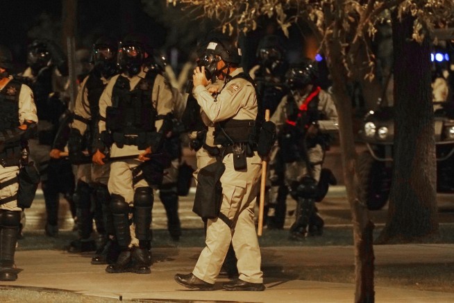 Dueling narratives of Arizona protests ended with tear gas
