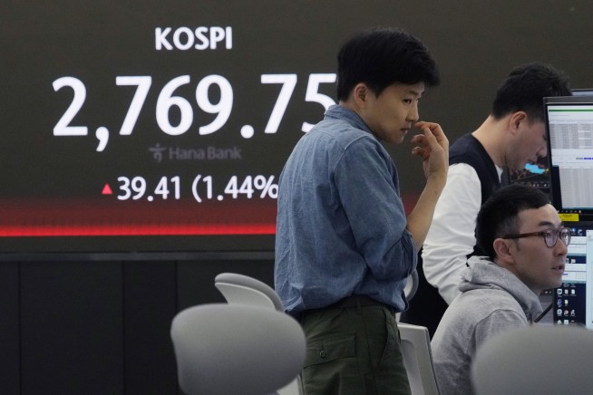 Stock market today: Asian shares advance after another round of Wall St records