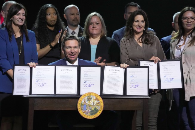 DeSantis signs bills targeting drag shows, transgender kids and the use of bathrooms and pronouns