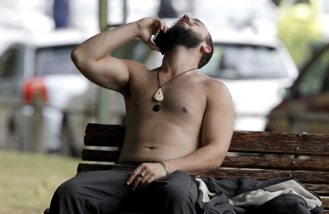 The Latest: 50 murder counts filed on mosque attack suspect