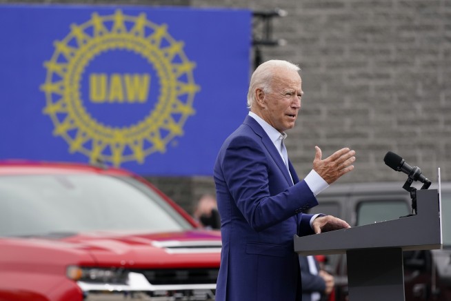Trump raises $210 million, robust but well short of Biden