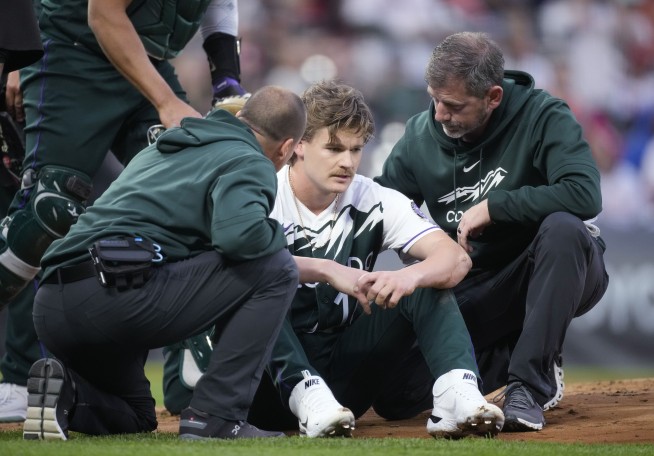 Rockies' Feltner released from hospital after skull fracture, concussion from line drive