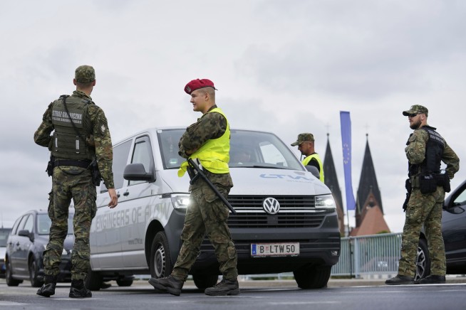 Poland reinstates border controls with Germany and Lithuania to discourage asylum-seekers