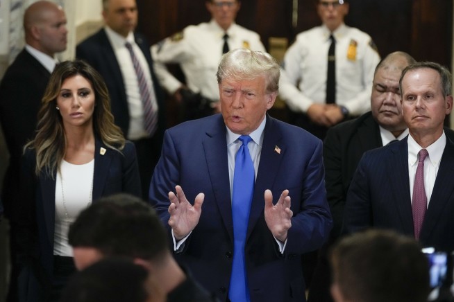 Trump seethes through the start of trial in New York lawsuit accusing him of lying about his wealth