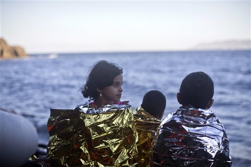 The Latest: Euro chief: Greece needs help with migrants