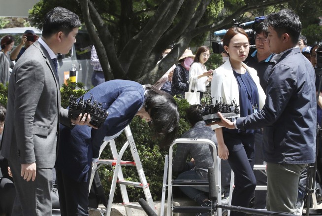 'Nut rage' Korean Air heiress questioned over housekeepers