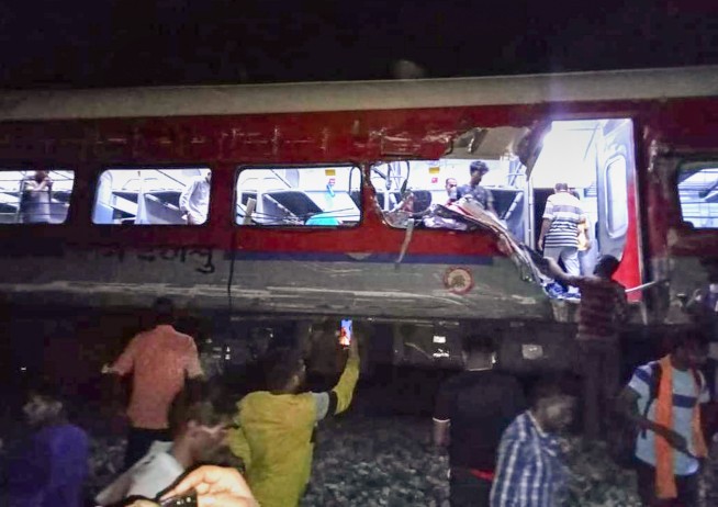India train crash death toll rises above 230 with 900 injured as rescuers comb through debris