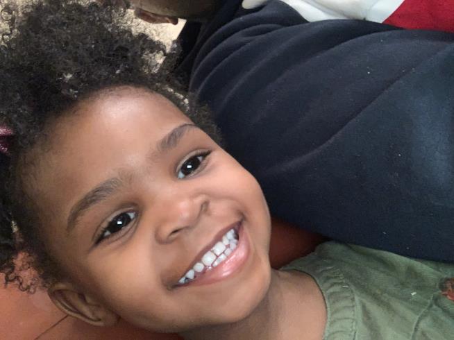 Mother of 2 girls found in shallow graves in Cleveland charged with murder