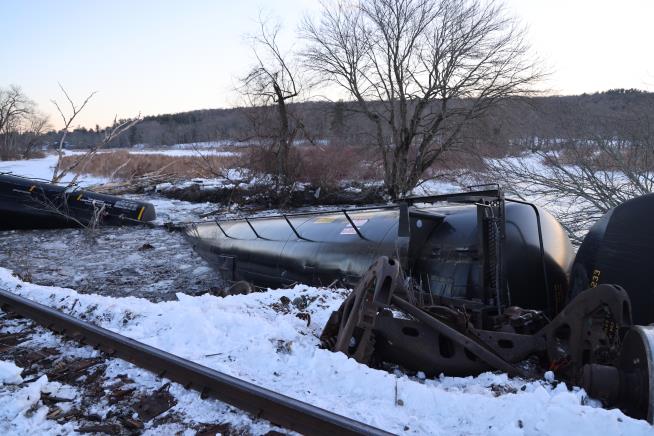 Freight train derails in Connecticut, sending cars carrying liquid propane into river