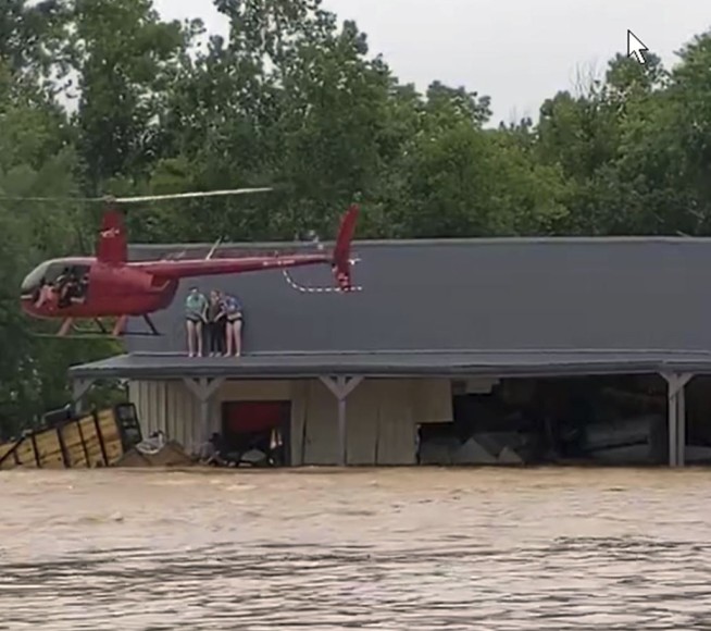 Alone in the sky, pilot and fiancee save 17 in Tenn. flood