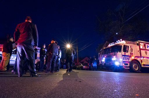 NYC officer shot in head, critically hurt; suspect arrested