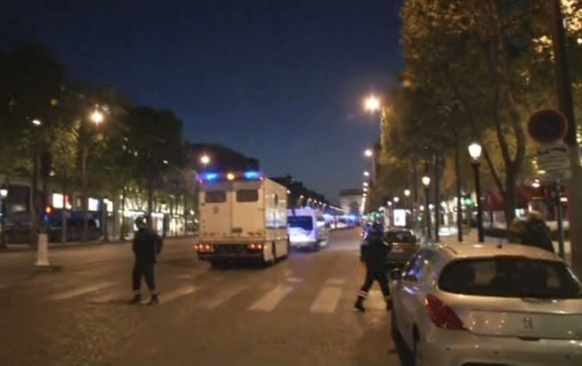 The Latest: Firearm in Paris attack compared to 'war weapon'