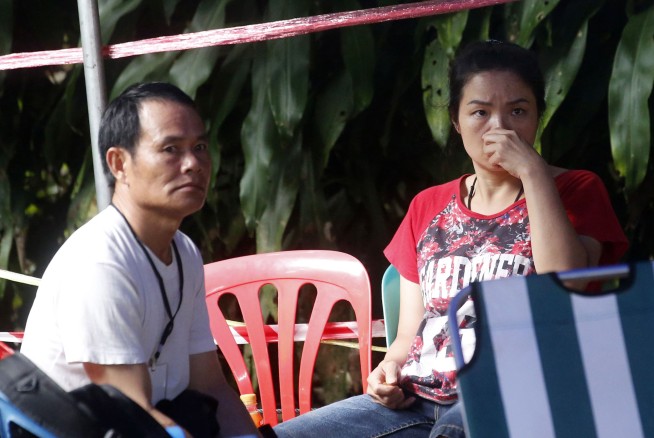 Thais fight water and oxygen levels in cave as diver dies