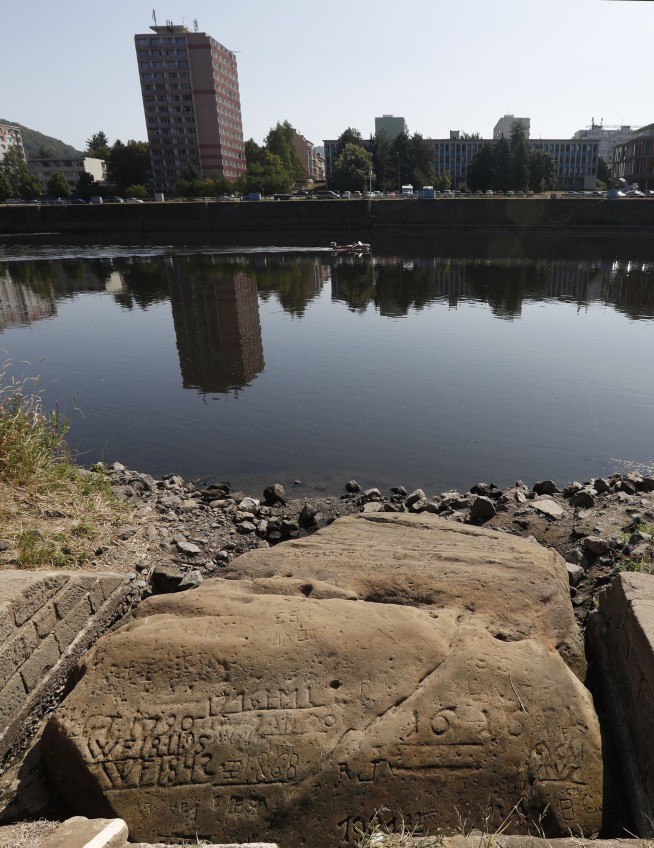 Drought reveals ancient 'hunger stones' in European river