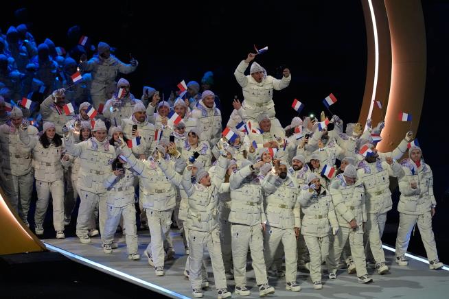 The Milan Cortina Olympics officially open with a multi-site ceremony for a spread-out Winter Games