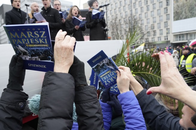 Poland marches defend John Paul II from abuse cover-up claim