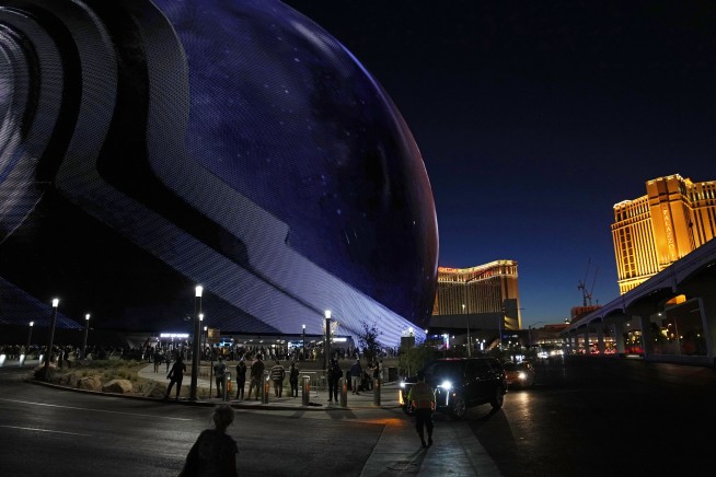 Rock climber scales massive Sphere venue near the Las Vegas Strip to protest abortion