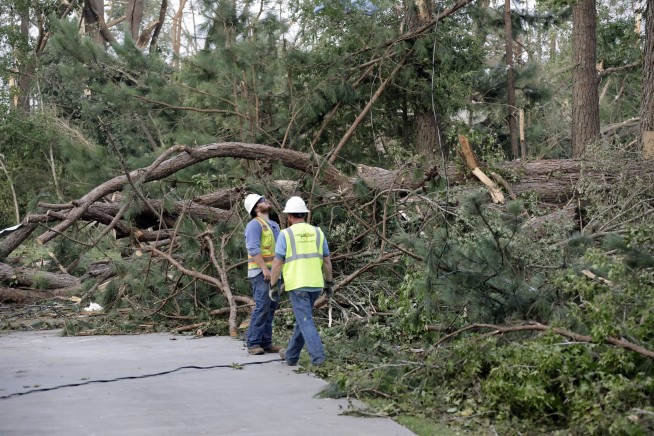 Tornado damages Pfizer plant in North Carolina as scorching heat and floods sock other parts of US