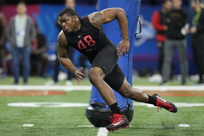 Jags take 'athletic freak' Walker with top pick in NFL draft