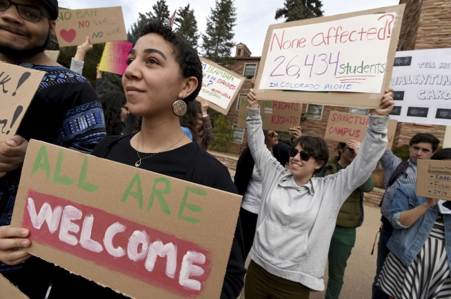 The Latest: Court denies claim it couldn't review travel ban