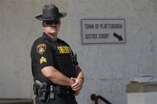 Arrested prison guard denies knowing of inmates' escape plot