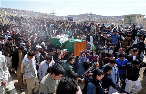 Afghanistan buries woman beaten to death by mob