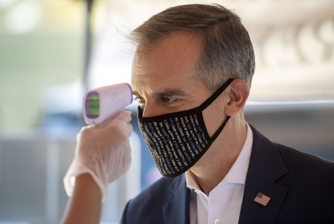 The Latest: Fans from abroad barred from Tokyo Olympics