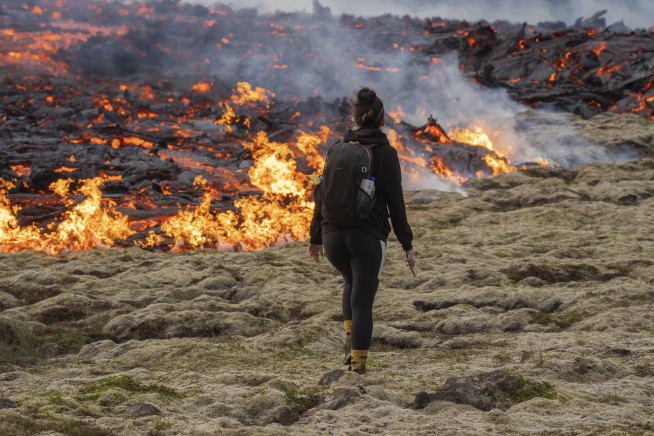 Iceland warns tourists to stay away from volcano erupting with lava and noxious gases