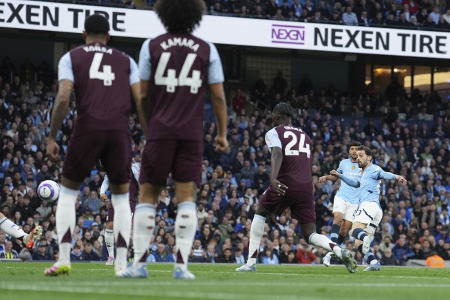 Man City scores late winner to beat Aston Villa 2-1 and boost Champions League hopes