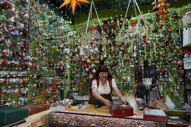 Holiday ornaments decorate life all year long in this Belgian shop