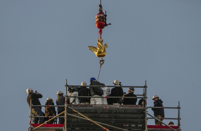 In pivotal moment, Notre Dame Cathedral spire gets golden rooster weathervane, a symbol of a phoenix