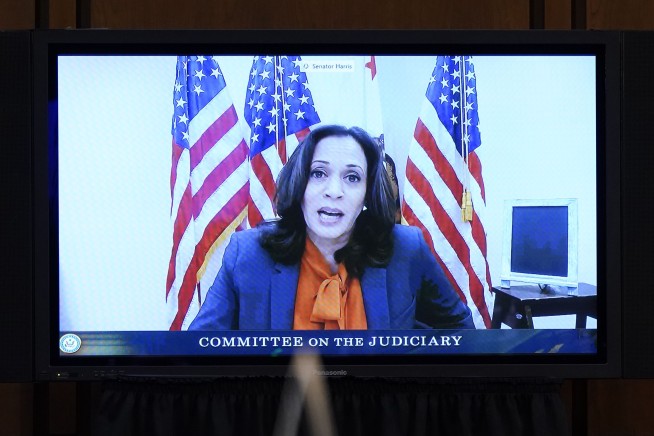 Harris suspends travel after staffer tests COVID-19 positive