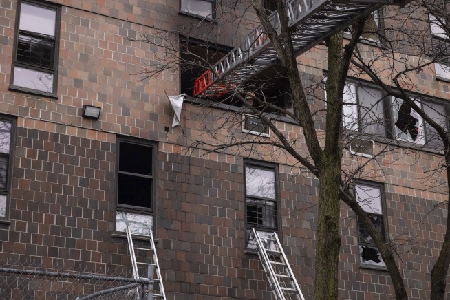 19 dead, including 9 children, in NYC apartment fire