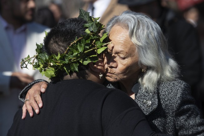A Maori king who urged racial unity in New Zealand is laid to rest and a new queen rises