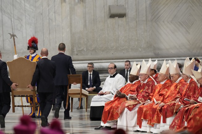 The Latest: No pope chosen as black smoke rises from Sistine Chapel