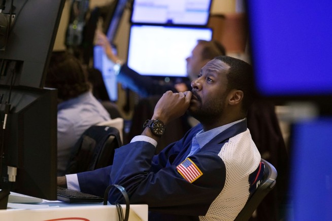 Stocks gain, pushing the Dow Jones industrials over 36,000