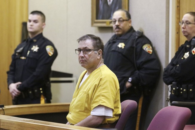 Businessman pleads not guilty in slaying of brother's family
