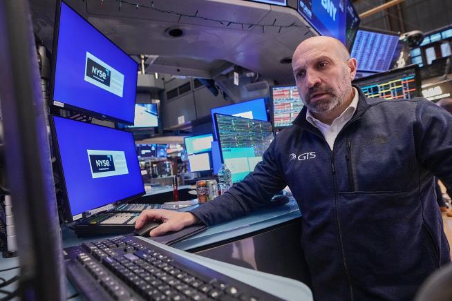 US stocks rise as gold hits another record and the dollar's value sinks again