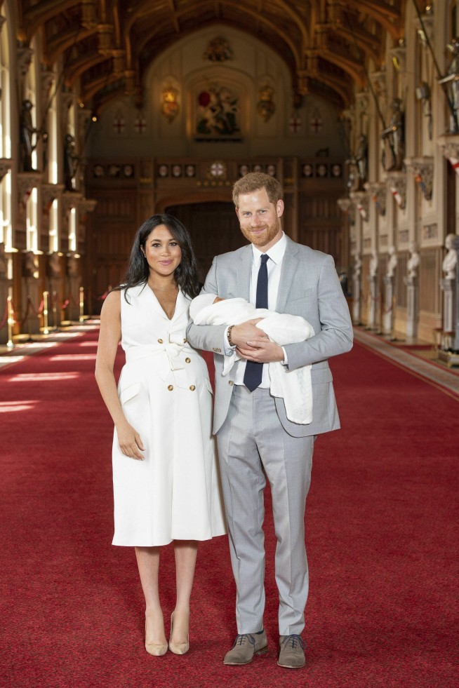 The Latest: Meghan, Harry name baby son Archie Harrison