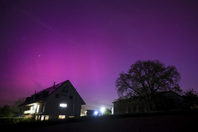 Solar storm hits Earth, producing colorful light shows across Northern Hemisphere