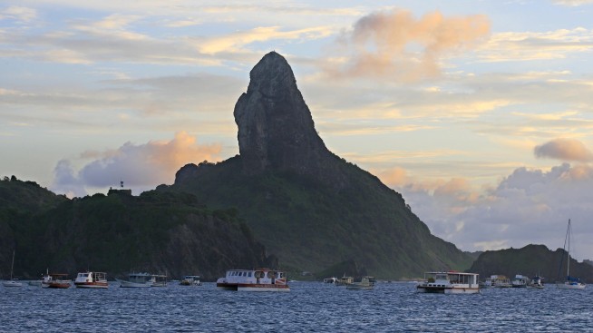 Four accused of altering virus tests to enter Brazil beach