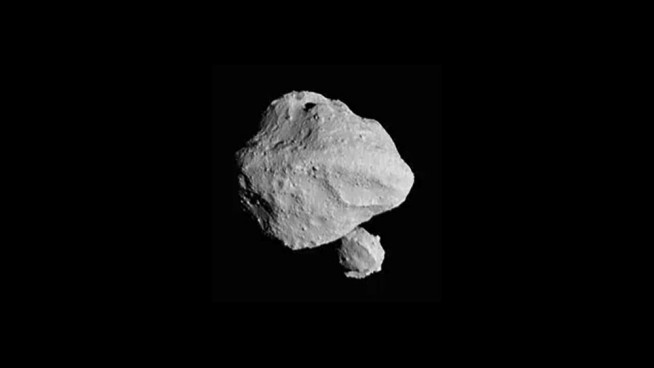 NASA spacecraft discovers tiny moon around asteroid during close flyby