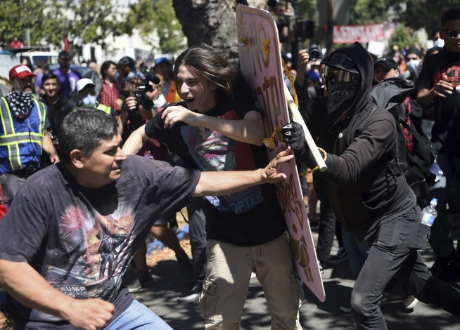 Black-clad anarchists swarm anti-hate rally in California