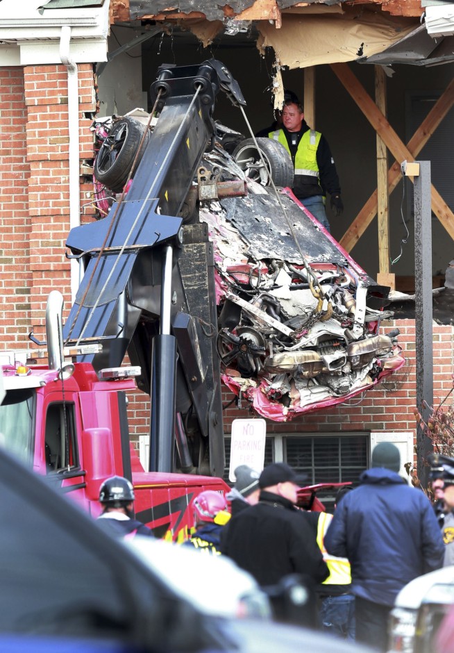 2 dead after Porsche crashes into building's 2nd floor